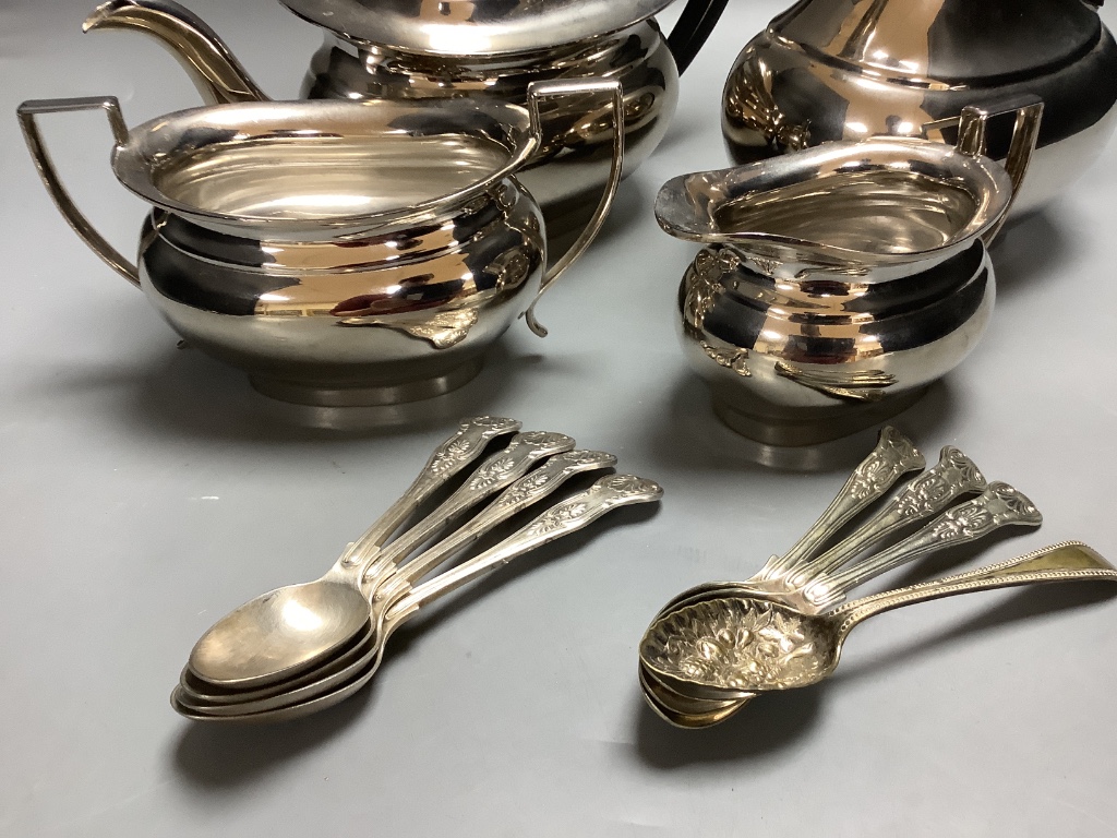 A four piece plated tea set and plated teaspoons.